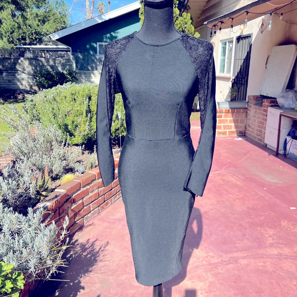 Hego black and sexy zipper down the back dress.